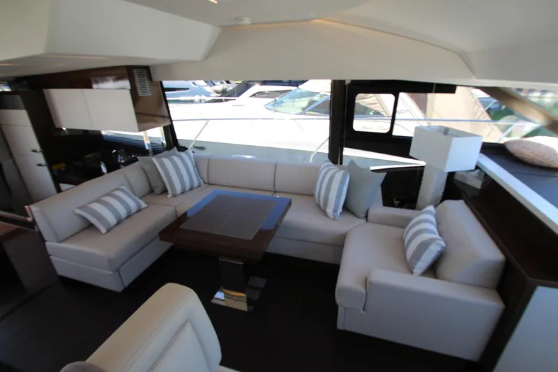 Slide: The Image of Luxurious interior of 2022 Prestige 520 yacht with elegant seating and modern decor. - 31