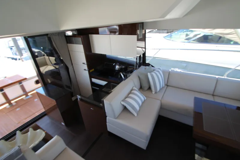 Slide: The Image of Luxurious interior of 2022 Prestige 520 yacht with modern kitchen and comfortable seating. - 34