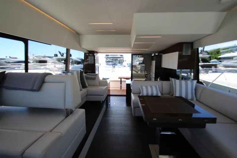 Slide: The Image of Luxurious interior of 2022 Prestige 520 yacht with modern seating and elegant design. - 41