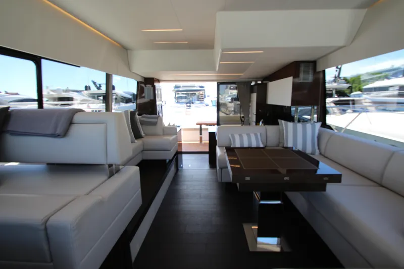 Slide: The Image of Luxurious interior of 2022 Prestige 520 yacht with modern seating and elegant design. - 43