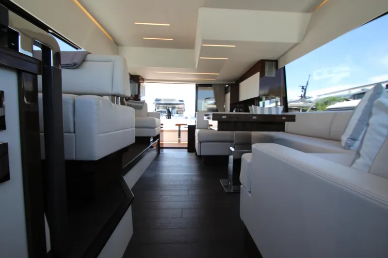 Slide: The Image of Luxurious interior of a 2022 Prestige 520 yacht, featuring elegant seating and modern design. - 44