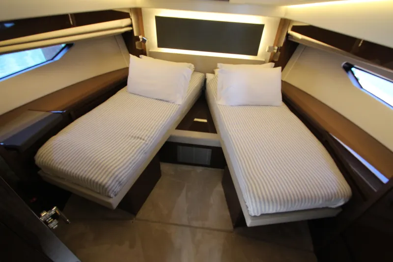Slide: The Image of Luxurious twin cabin interior of 2022 Prestige 520 yacht with modern design. - 48