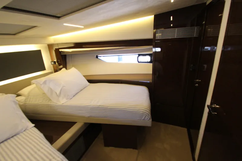 Slide: The Image of Luxurious cabin interior of 2022 Prestige 520 yacht with twin beds and modern design. - 53