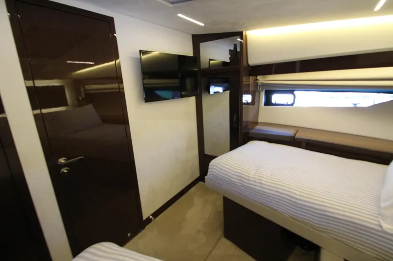 Slide: The Image of Luxurious cabin interior of 2022 Prestige 520 yacht with modern amenities and sleek design. - 54