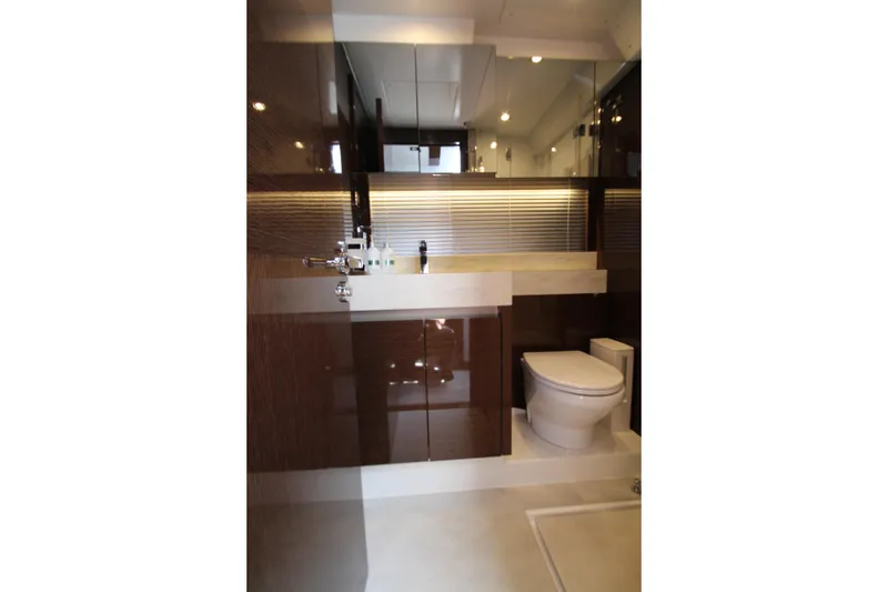 Slide: The Image of Luxurious bathroom interior of 2022 Prestige 520 yacht, featuring modern fixtures and elegant design. - 63