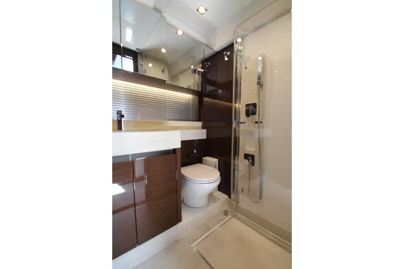 Slide: The Image of Luxurious bathroom interior of 2022 Prestige 520 yacht, featuring modern fixtures and elegant design. - 64