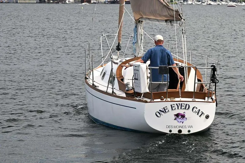 Slide: The Image of 1977 Mercator Offshore sailboat named "One Eyed Cat" on the water in Des Moines, WA. - 3