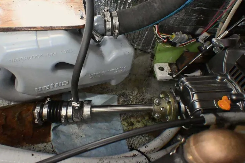 Slide: The Image of Engine compartment of a 1977 Mercator Offshore boat, featuring Vetus waterlock system. - 25