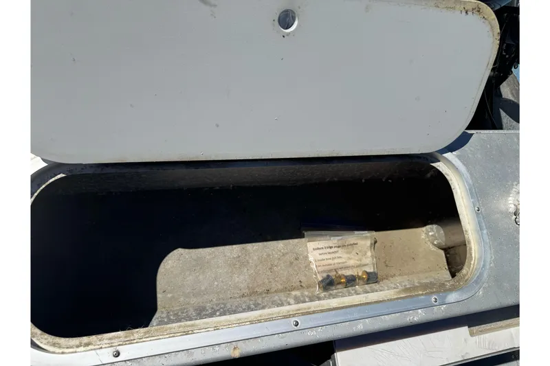 Slide: The Image of Open storage compartment on a 2011 North River 21' Seahawk boat. - 20