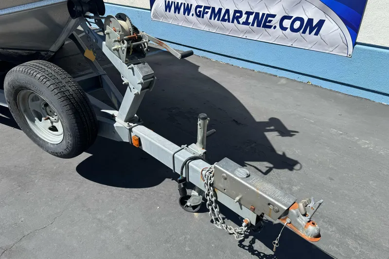 Slide: The Image of Trailer hitch of a 2011 North River 21' Seahawk boat, parked on pavement. - 7