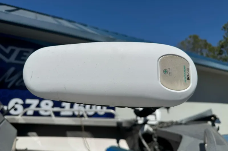 Slide: The Image of Close-up of a boat motor part on a 2011 North River 21' Seahawk. - 8