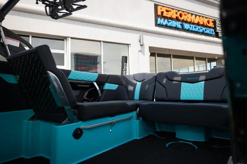 Slide: The Image of Interior of 2026 MasterCraft XT24 boat at Performance Marine Watersports showroom. - 36