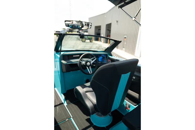 Slide: The Image of Interior of 2026 MasterCraft XT24 boat with modern steering and dashboard. - 20