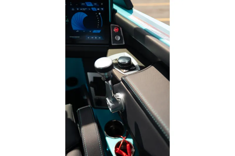 Slide: The Image of 2026 MasterCraft XT24 boat dashboard with control panel and touchscreen display. - 22
