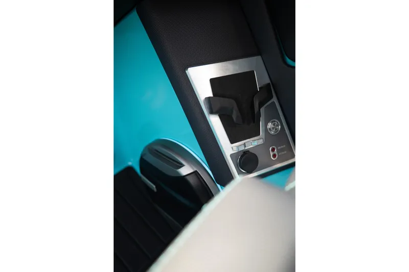 Slide: The Image of 2026 MasterCraft XT24 boat interior control panel with sleek design and modern features. - 39