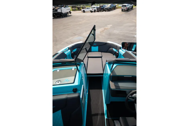 Slide: The Image of 2026 MasterCraft XT24 boat interior with sleek seating and modern design. - 40