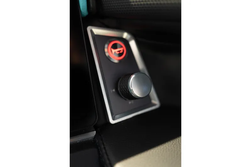 Slide: The Image of Close-up of 2026 MasterCraft XT24 control knob with red indicator light. - 25