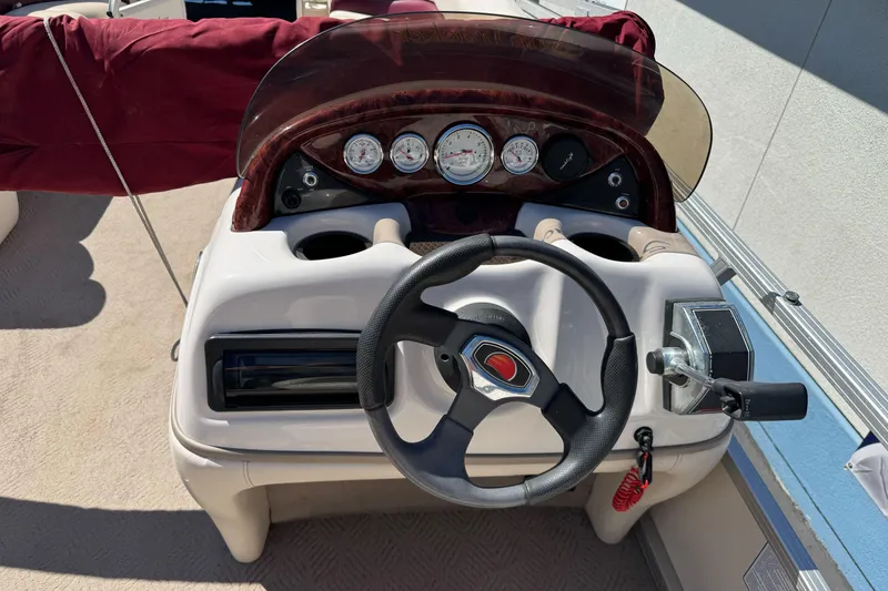 Slide: The Image of Steering console of a 2011 Sun Tracker Party Barge 21 pontoon boat. - 20