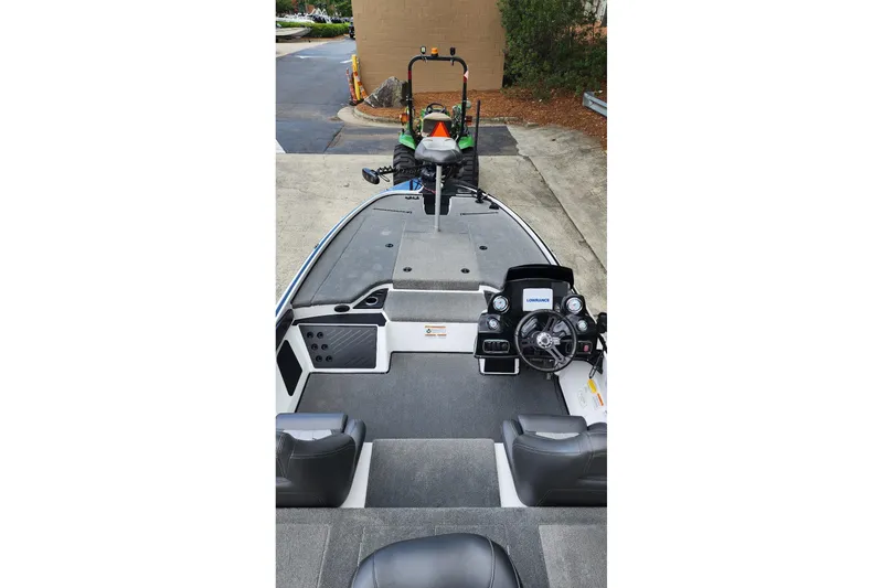 Slide: The Image of 2017 Nitro Z18 boat interior with steering console and seating. - 3