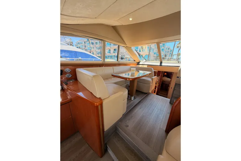 Slide: The Image of Luxurious interior of 2007 Viking Princess 54 Flybridge yacht with elegant seating and table. - 30