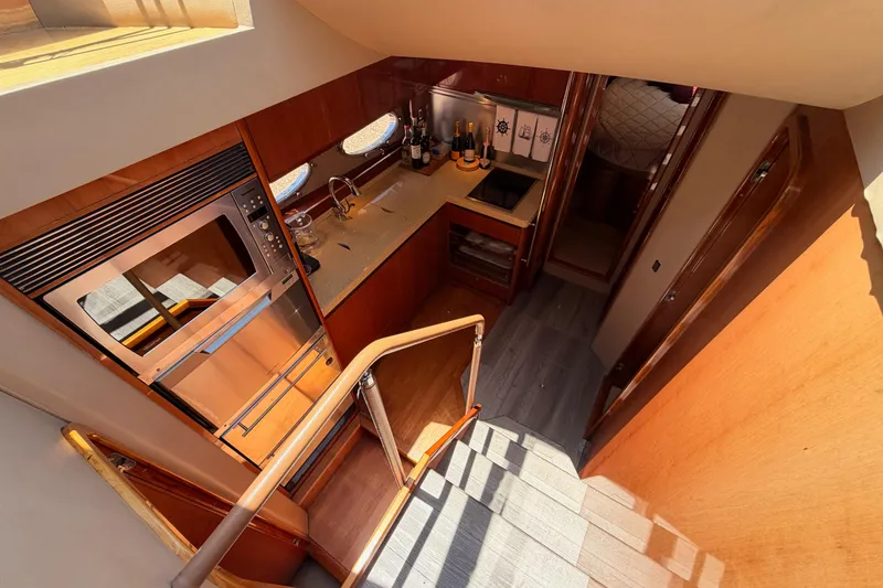 Slide: The Image of Luxurious 2007 Viking Princess 54 Flybridge yacht interior with modern kitchen amenities. - 43
