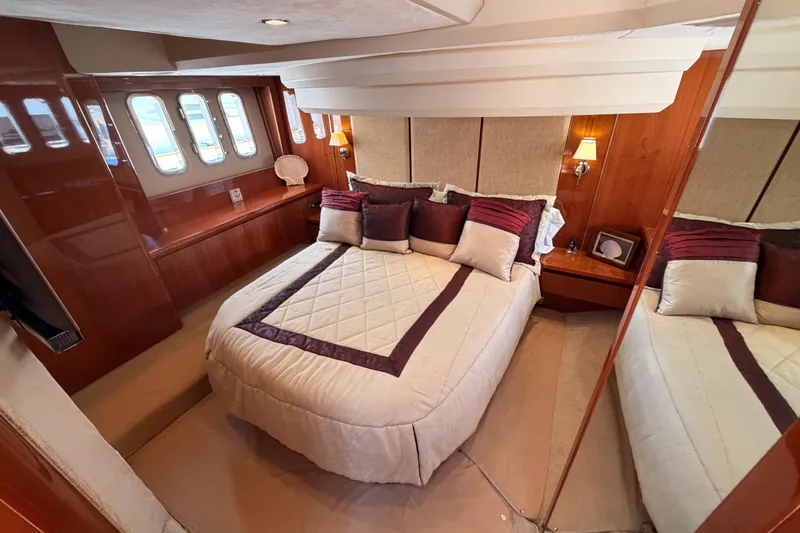 Slide: The Image of Luxurious bedroom interior of 2007 Viking Princess 54 Flybridge yacht with elegant decor. - 67