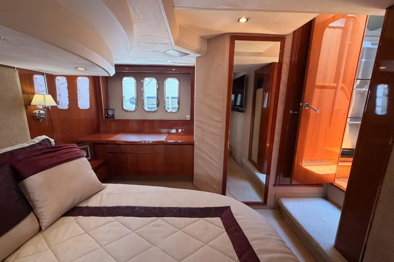Slide: The Image of Luxurious interior of 2007 Viking Princess 54 Flybridge yacht with elegant wood finishes. - 71