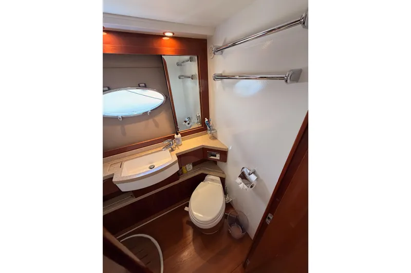 Slide: The Image of Luxurious bathroom in 2007 Viking Princess 54 Flybridge yacht with modern fixtures and elegant design. - 75