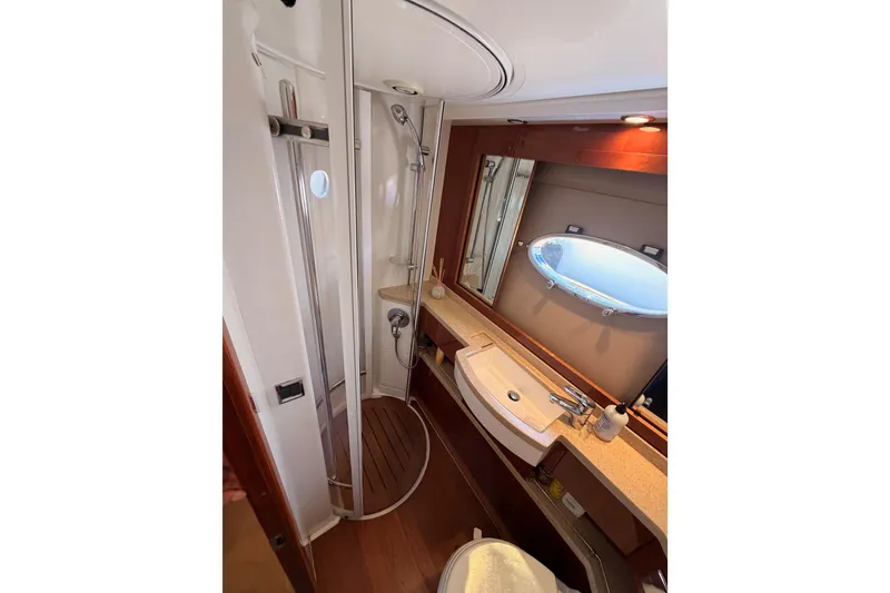 Slide: The Image of Luxurious bathroom in 2007 Viking Princess 54 Flybridge yacht with modern fixtures. - 76