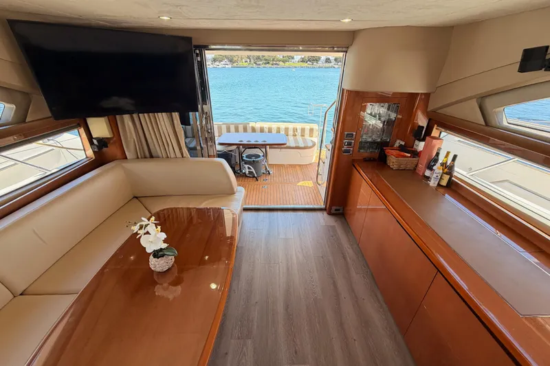 Slide: The Image of Luxurious interior of 2007 Viking Princess 54 Flybridge yacht with elegant seating and scenic ocean view. - 81