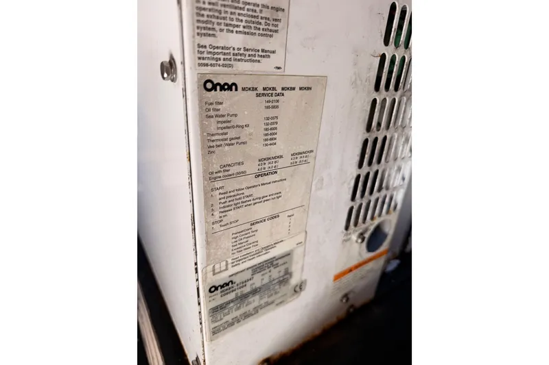 Slide: The Image of Label on Onan generator inside 2007 Viking Princess 54 Flybridge yacht. - 88