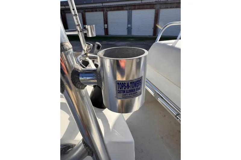 Slide: The Image of Stainless steel cup holder on a 2006 South Shore 26 boat. - 12