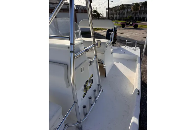 Slide: The Image of 2006 South Shore 26 boat with sleek design and sturdy metal railings. - 25