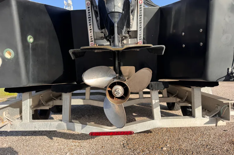 Slide: The Image of Rear view of a 2006 South Shore 26 boat propeller on a trailer. - 5