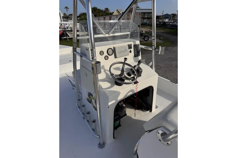Slide: The Image of Steering console of a 2006 South Shore 26 boat with Garmin navigation system. - 6