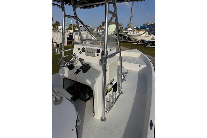Slide: The Image of Center console of a 2006 South Shore 26 boat with Garmin navigation system. - 7