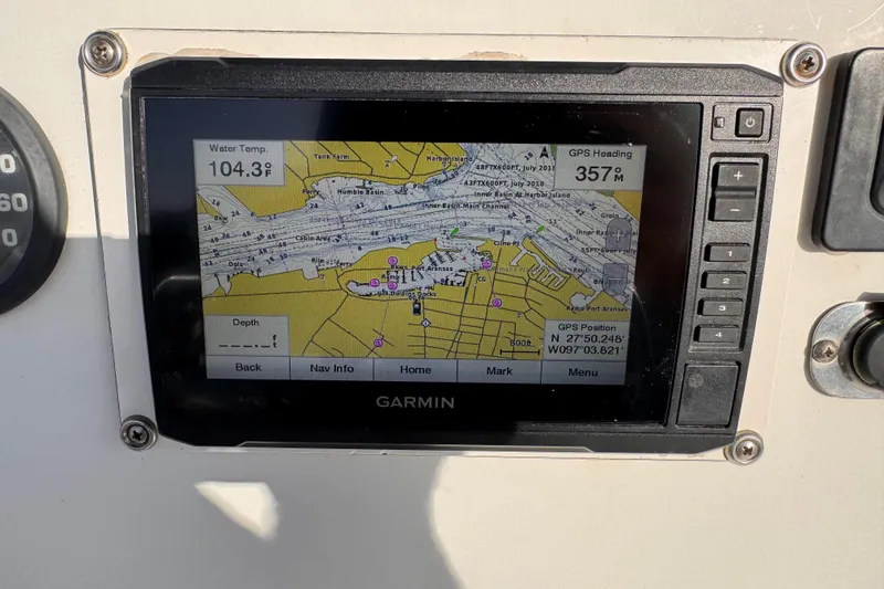 Slide: The Image of Garmin GPS display on 2006 South Shore 26 boat, showing navigation map and water temperature. - 9