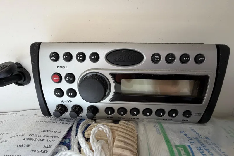 Slide: The Image of Clarion CMD4 stereo system on a 2004 Sea Ray 240 Sundeck boat. - 22
