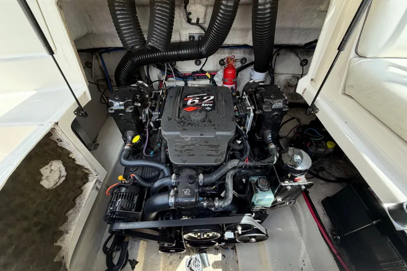 Slide: The Image of Engine compartment of a 2004 Sea Ray 240 Sundeck with MerCruiser 6.2 MPI engine. - 31