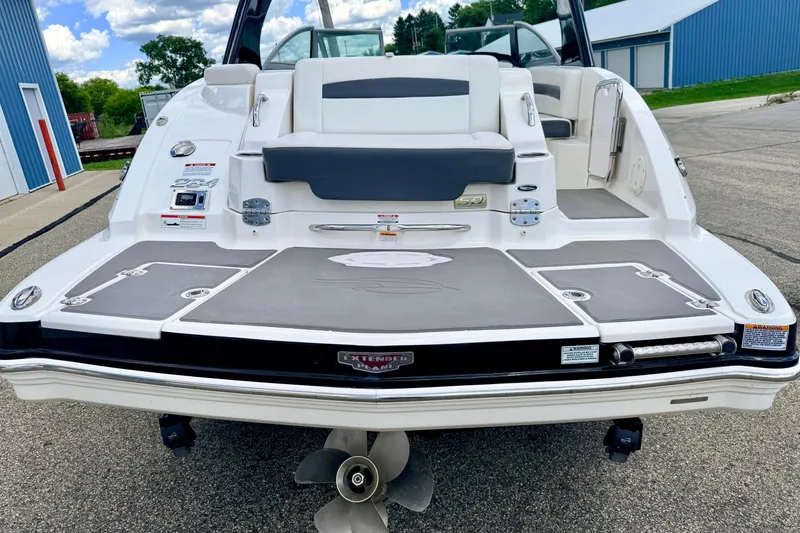 Slide: The Image of 2015 Chaparral Sunesta 264 boat rear view with swim platform and seating. - 15