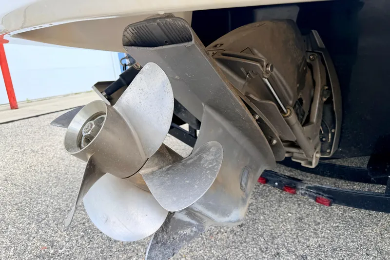 Slide: The Image of Propeller of a 2015 Chaparral Sunesta 264 boat on a trailer. - 16