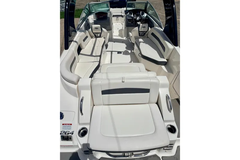 Slide: The Image of 2015 Chaparral Sunesta 264 boat interior with spacious seating and modern design. - 24