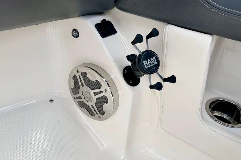 Slide: The Image of Interior of 2015 Chaparral Sunesta 264 with RAM mount and speaker. - 51
