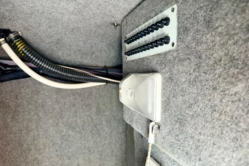 Slide: The Image of 2015 Chaparral Sunesta 264 interior wiring and fuse panel detail. - 65
