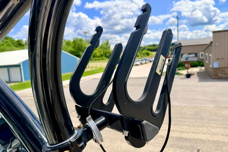 Slide: The Image of Wakeboard rack on a 2015 Chaparral Sunesta 264 boat under a blue sky. - 95