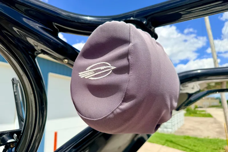 Slide: The Image of Protective cover on Chaparral Sunesta 264 boat, 2015 model, under sunny sky. - 96
