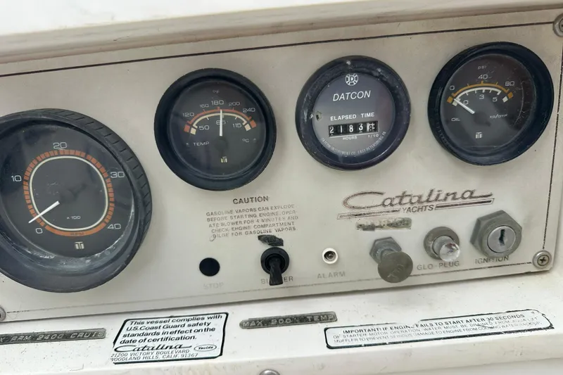 Slide: The Image of Instrument panel of a 1985 Catalina 36 yacht with gauges and ignition controls. - 39