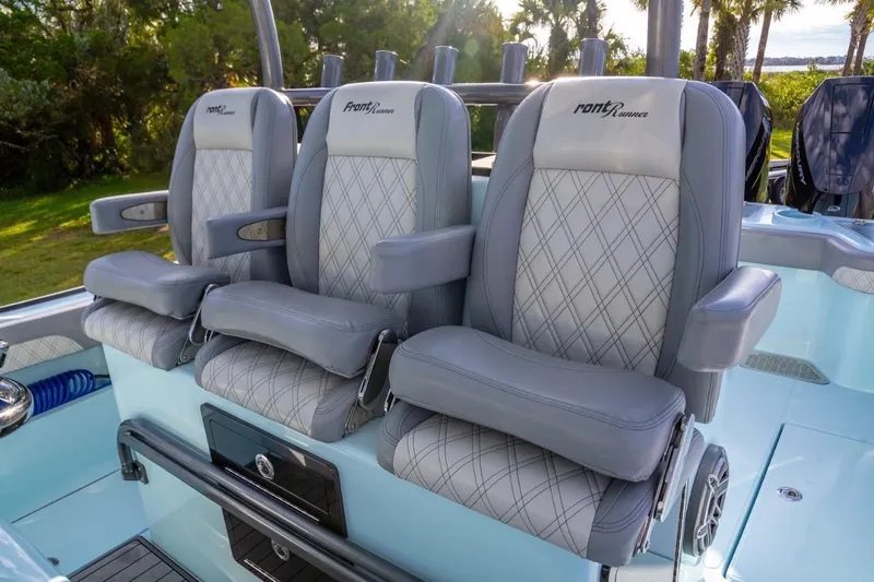 Slide: The Image of Luxurious seating on 2024 Front Runner 36 Center Console boat, featuring diamond-stitched upholstery. - 10