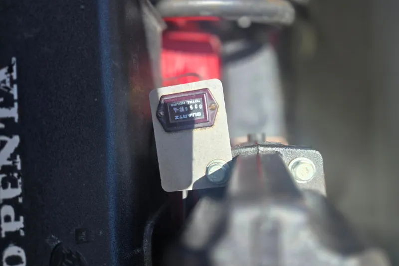 Slide: The Image of Close-up of a 2002 Chris-Craft Launch 28 GT I/O engine component. - 16