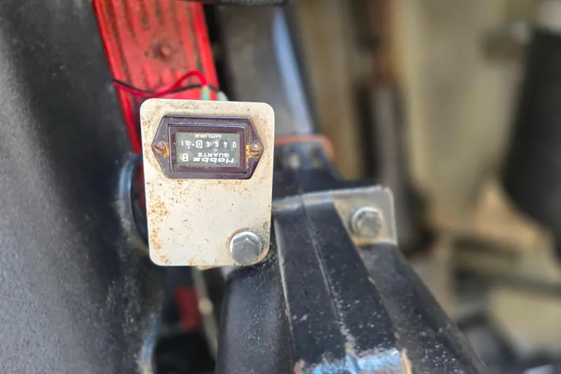 Slide: The Image of Close-up of a Hobbs hour meter on a 2002 Chris-Craft Launch 28 GT I/O boat. - 17